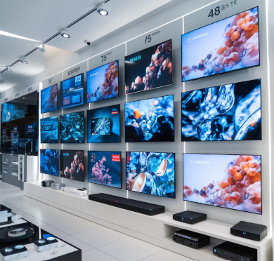 Smart TV display section with 4K televisions at Novelty Telecom